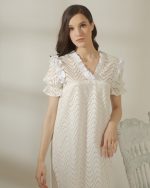 Dela Sierra in White